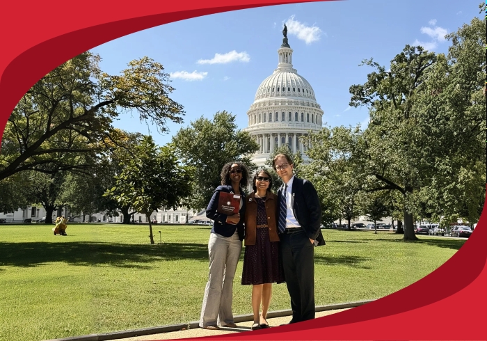 ASH members pose in front of the Capitol Building.