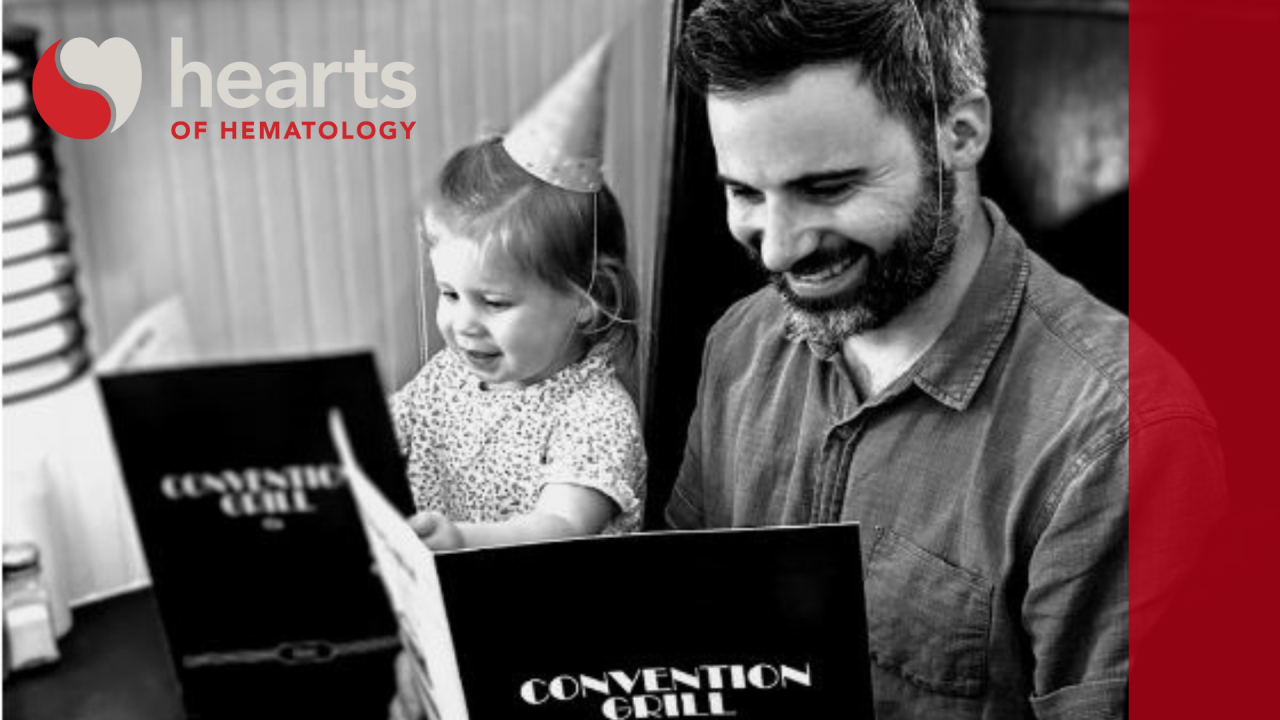 A photo of Jacob Cogan and a child, with hearts of hematology logo and graphic