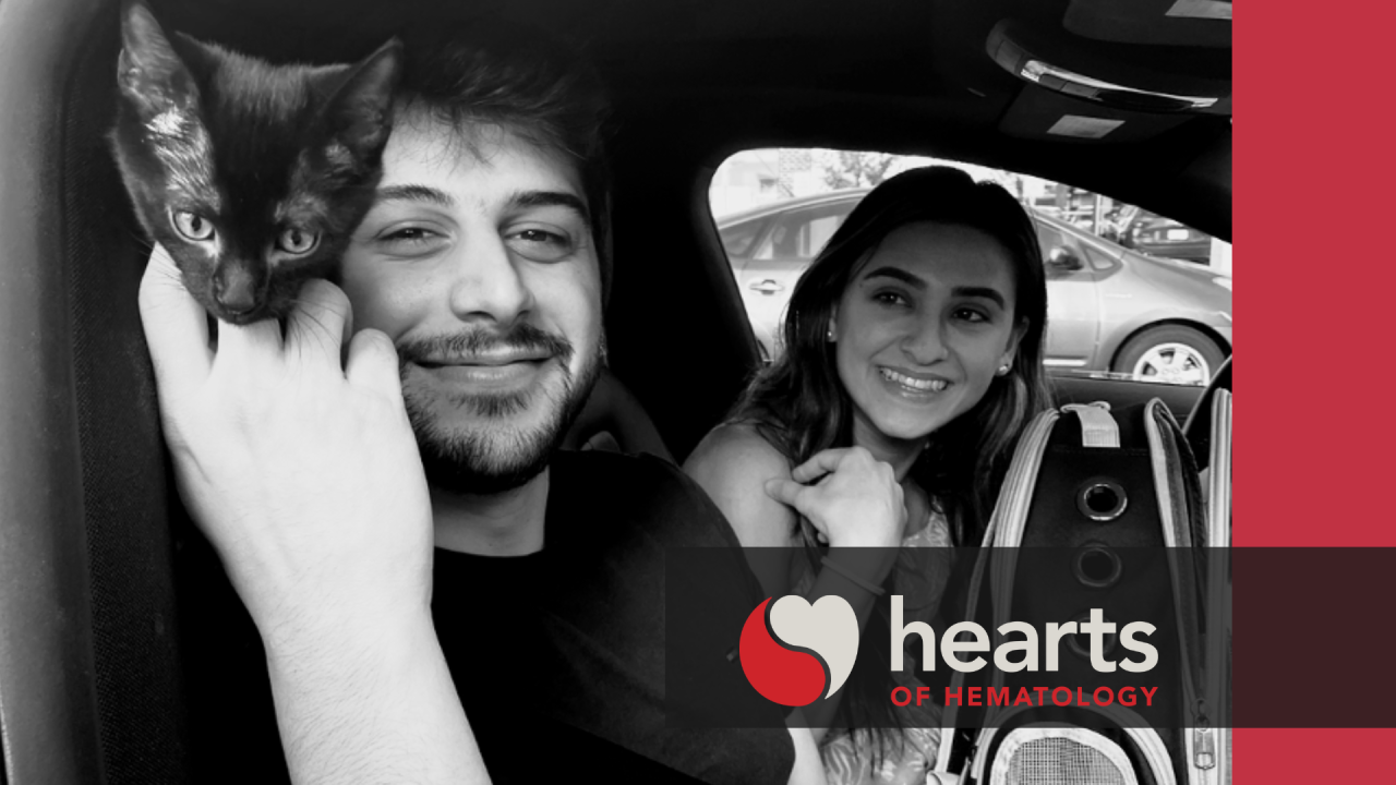 Saif Alshaka and a friend with hearts and hematology logo and branding