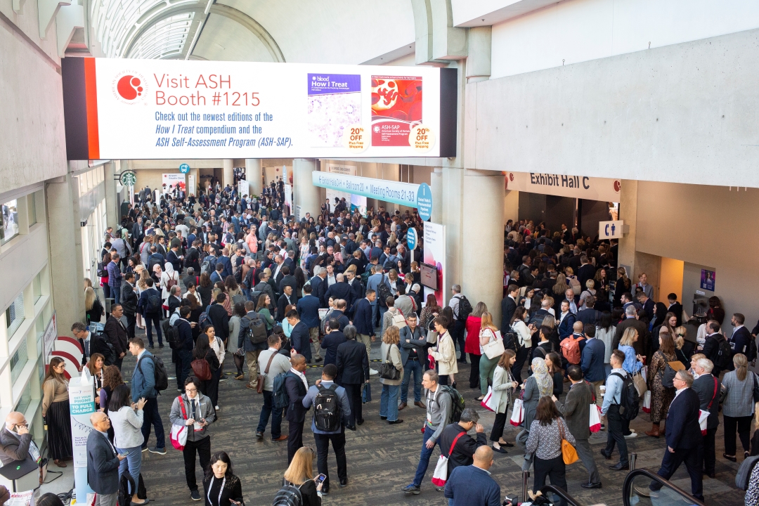 Attendees gather and traverse the concourse at the ASH annual meeting.