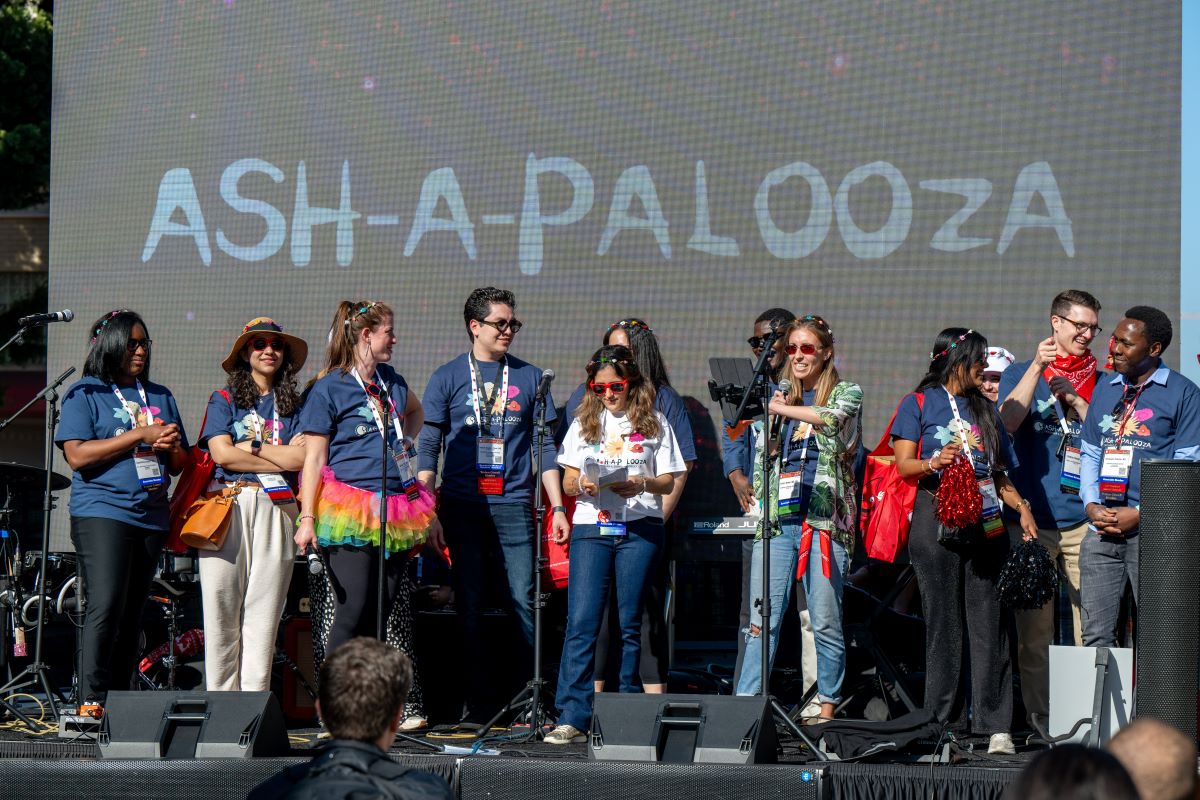ASH A Palooza leaders assemble on stage.