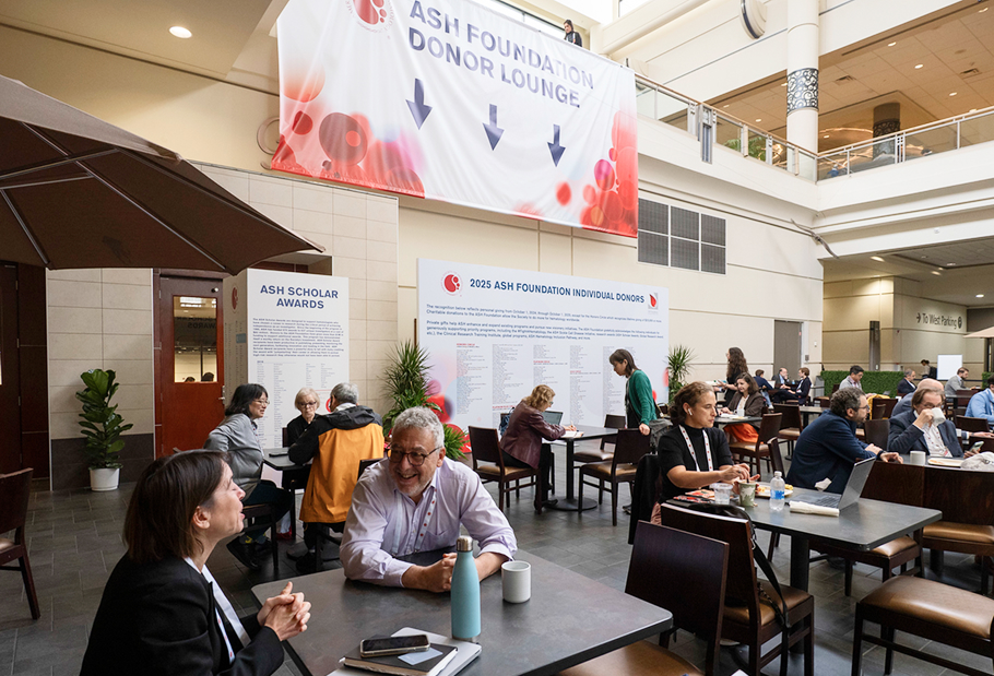 A photo of ASH Foundation Lounge with people having conversation 