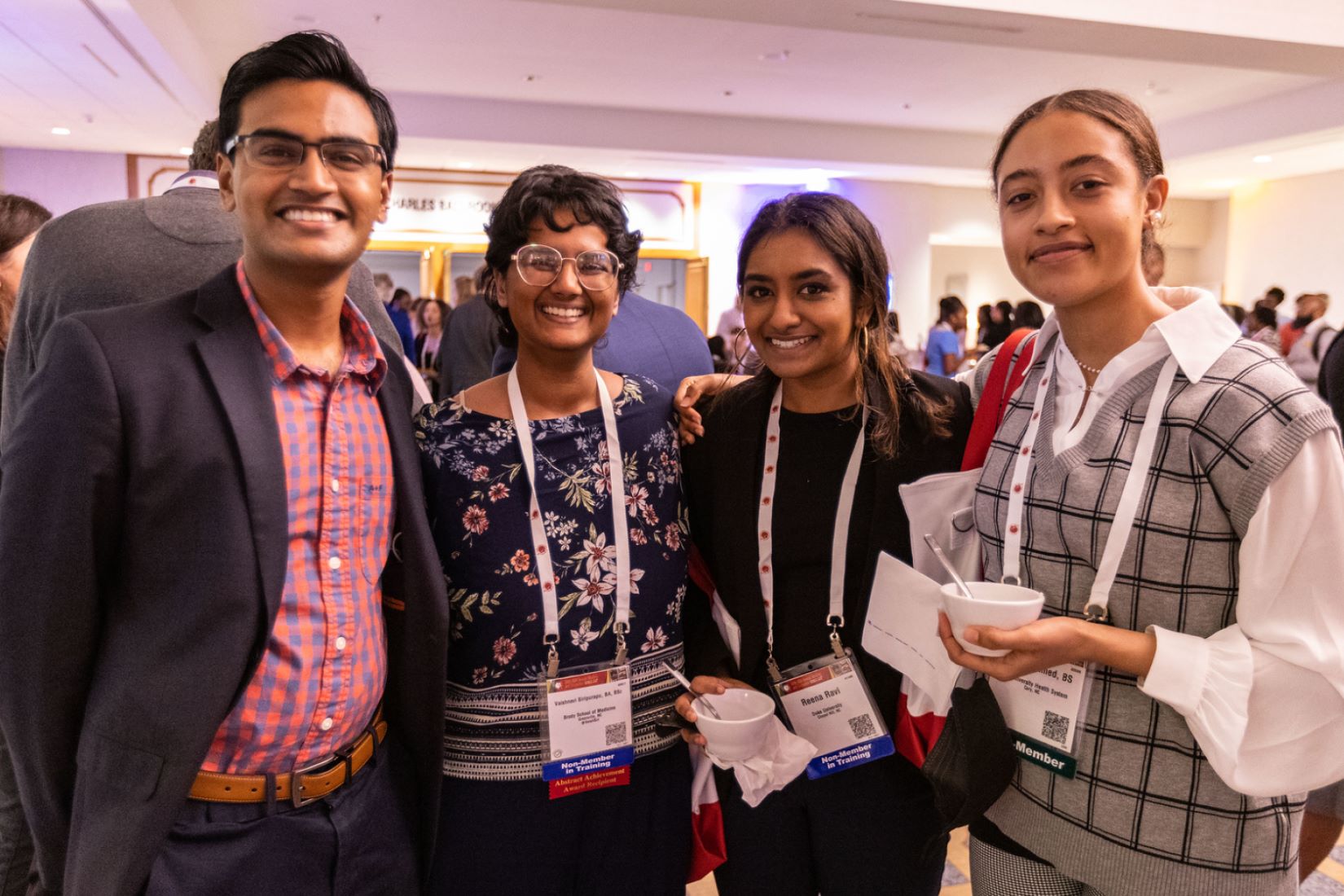 Annual meeting attendees pose at an event